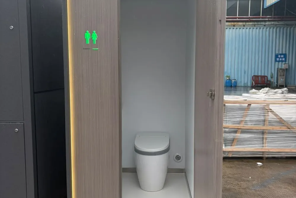 Unidad abierta: interior con lavabo e indicador de uso